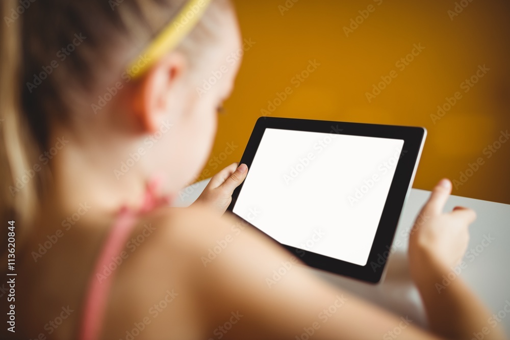 Girl using digital tablet 