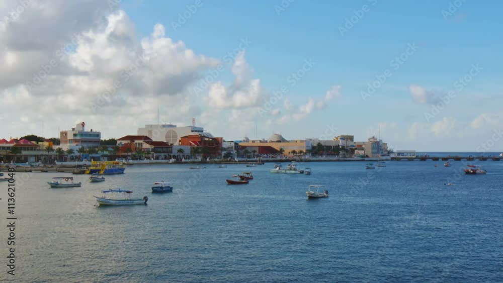 isla mujeres harbor as seen from the sea cityscape skyline island in the background isla mujeres harbor as seen from the sea cityscape skyline island in the background