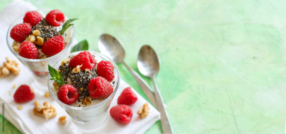 Yogurt with chia seeds, walnuts and raspberries Yogurt with chia seeds, walnuts and raspberries