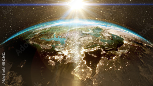 Highly detailed epic sunrise over world skyline. Planet earth Europe zone with night time city. 3D Rendering animation using satellite imagery (NASA)