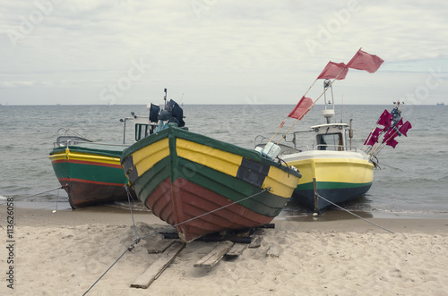 Fototapeta Naklejka Na Ścianę i Meble -  Fishing boat on the sea shore