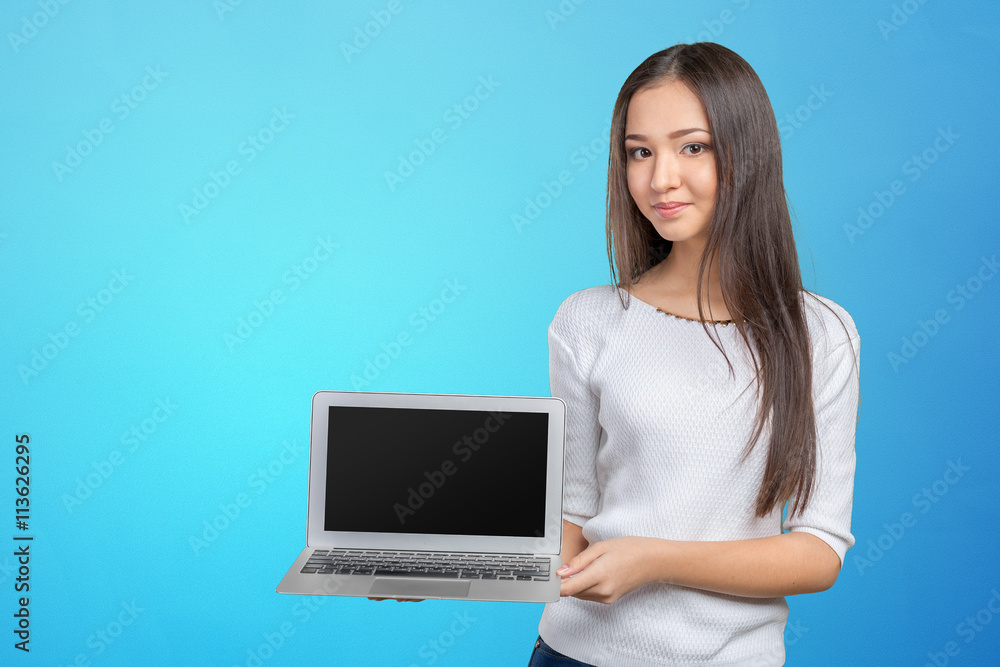 portrait of beautiful young woman holding laptop isolated portrait of beautiful young woman holding laptop isolated