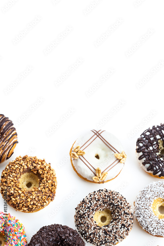 Fototapeta premium various donuts on white background