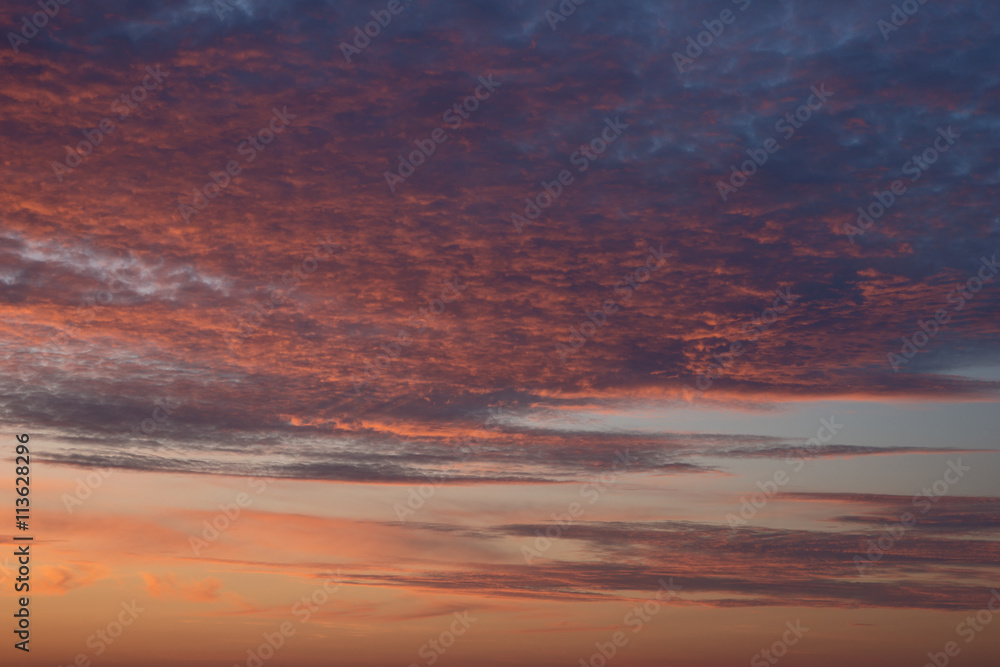 sunrise in the colored sky, soft clouds and abstract background