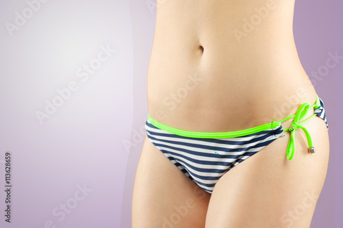 Isolated Young Girl In Swimming Suit Body Part