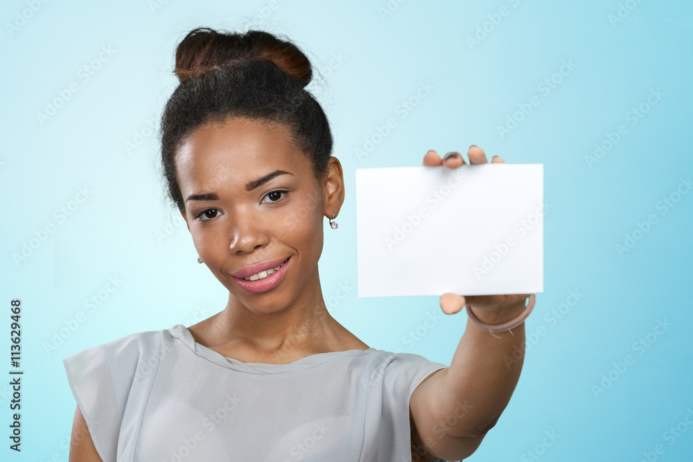 African american woman holding blank paper