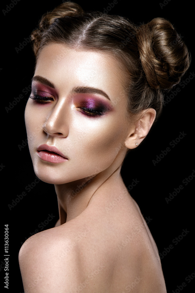 Woman portrait isolated on black background. Young lady posing with glamour hairstyle and gorgeous make up. Woman portrait isolated on black background. Young lady posing with glamour hairstyle and gorgeous make up.