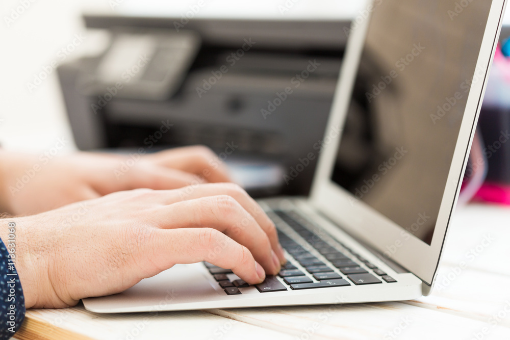 Man's hand making copies. Working with printer Man's hand making copies. Working with printer