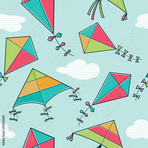 Vector kites flying in the sky seamless pattern