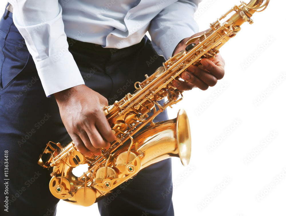 Obraz premium African American jazz musician playing the saxophone, closeup