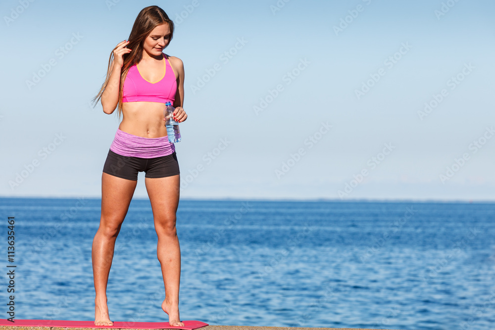 Woman drinking water after sport gym outdoor Woman drinking water after sport gym outdoor