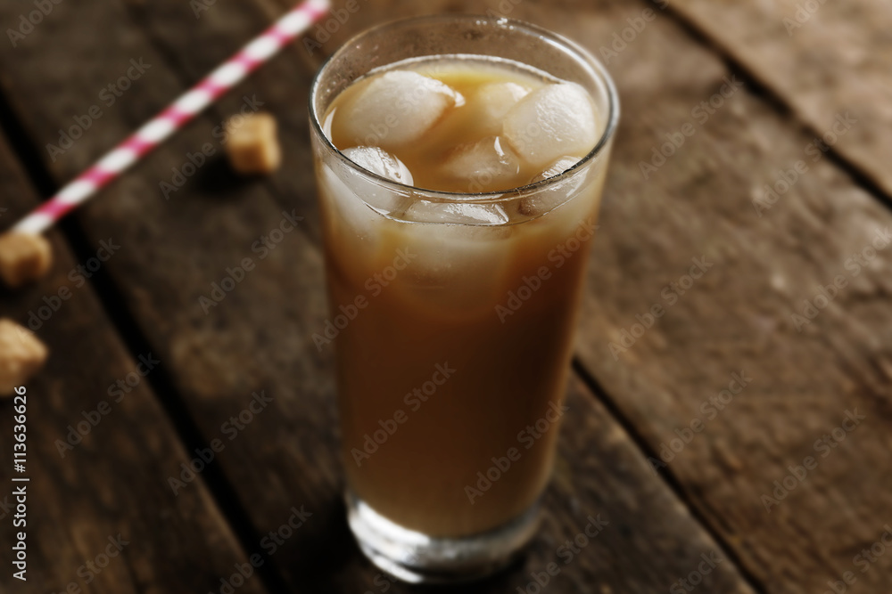 Cold coffee on wooden table Cold coffee on wooden table