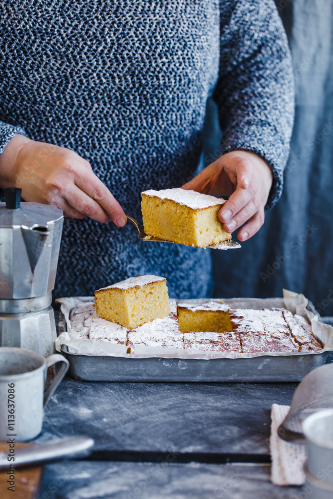 Female hand keep of portion cornbread cake. Female hand keep of portion cornbread cake.