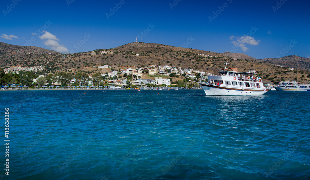 white ship with tourists sailing in the Gulf of Mirabello. Crete, Greece