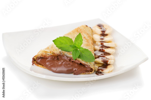 Crepes with chocolate cream and banana