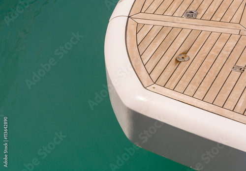 wooden deck of a yacht on sea background