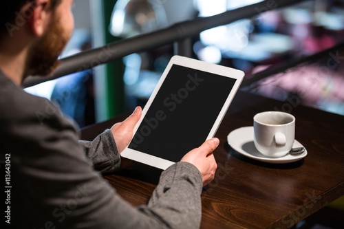 Man using digital tablet