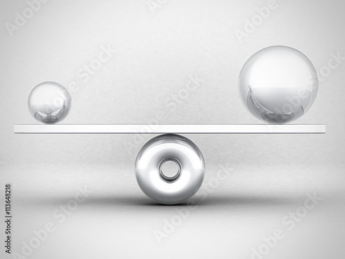 Balance Concept Big And Small Metallic Spheres