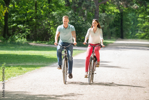 Couple Riding Bicycle