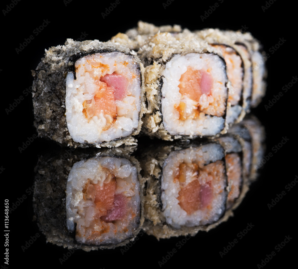 Grilled sushi rolls with salmon, tuna and eel Grilled sushi rolls with salmon, tuna and eel