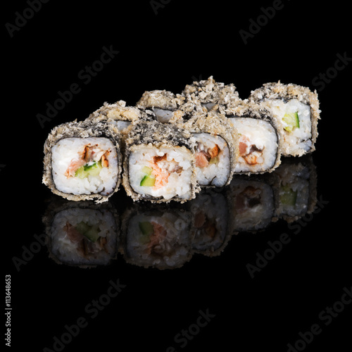 Grilled sushi rolls with salmon and eel