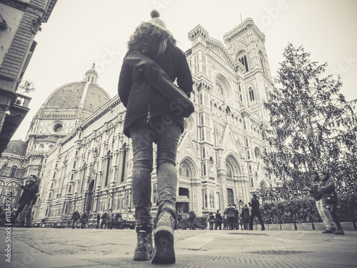 black and white florence italy woman walking towards the cathedr photo