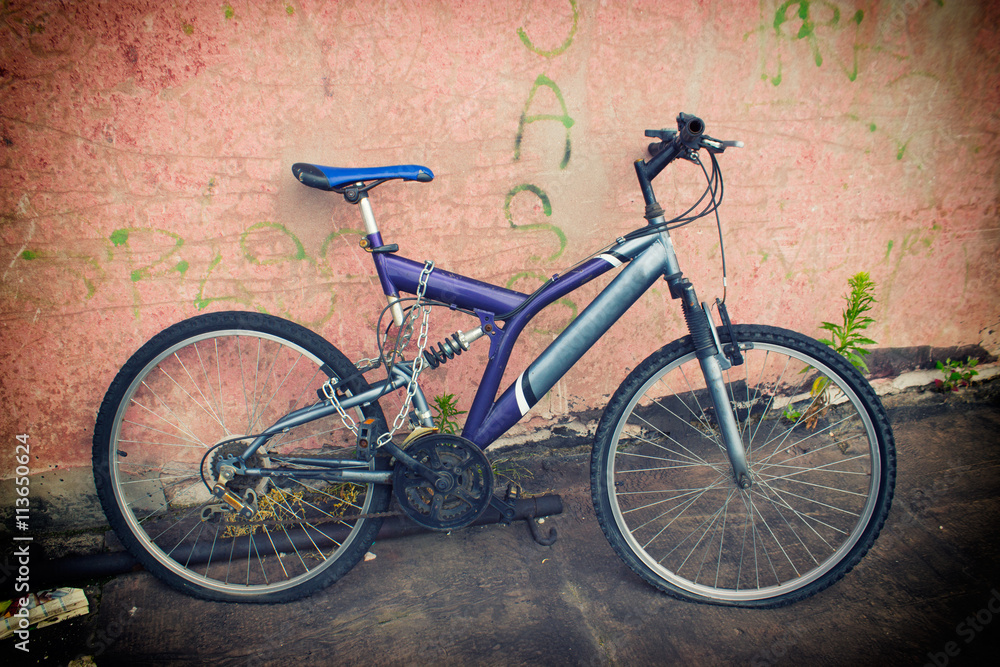 Old bicycle against the wall