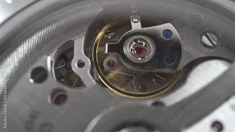 Macro dolly shot of Swiss made wrist watch movement Macro dolly shot of Swiss made wrist watch movement