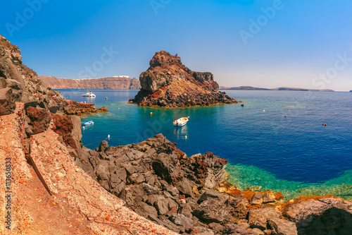 Armeni bay beach near Oia village at Santorini island in Aegean sea, Greece photo