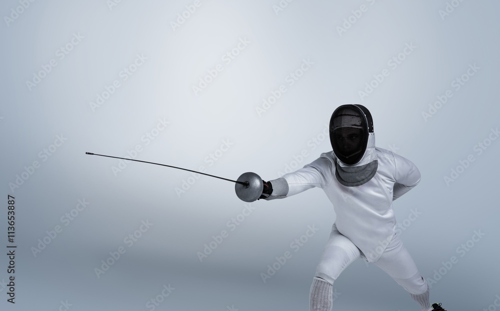 Obraz premium Composite image of man wearing fencing suit practicing with sword