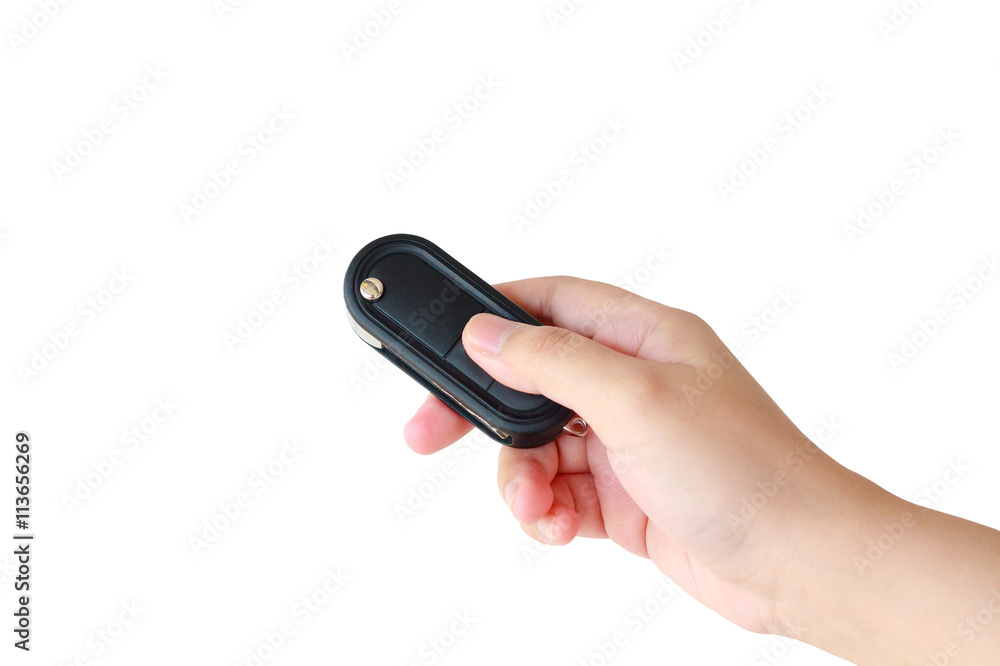 women hand presses on the remote control car key alarm systems women hand presses on the remote control car key alarm systems