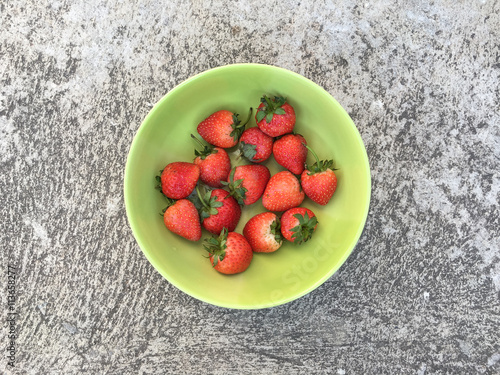 Strawberries in green cup