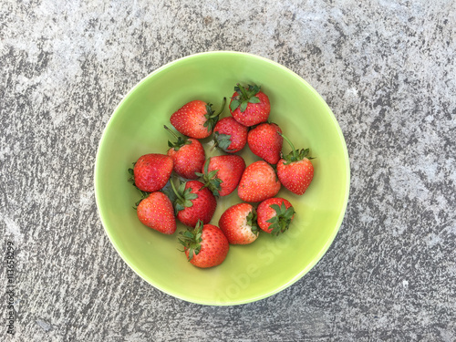 Strawberries in green cup