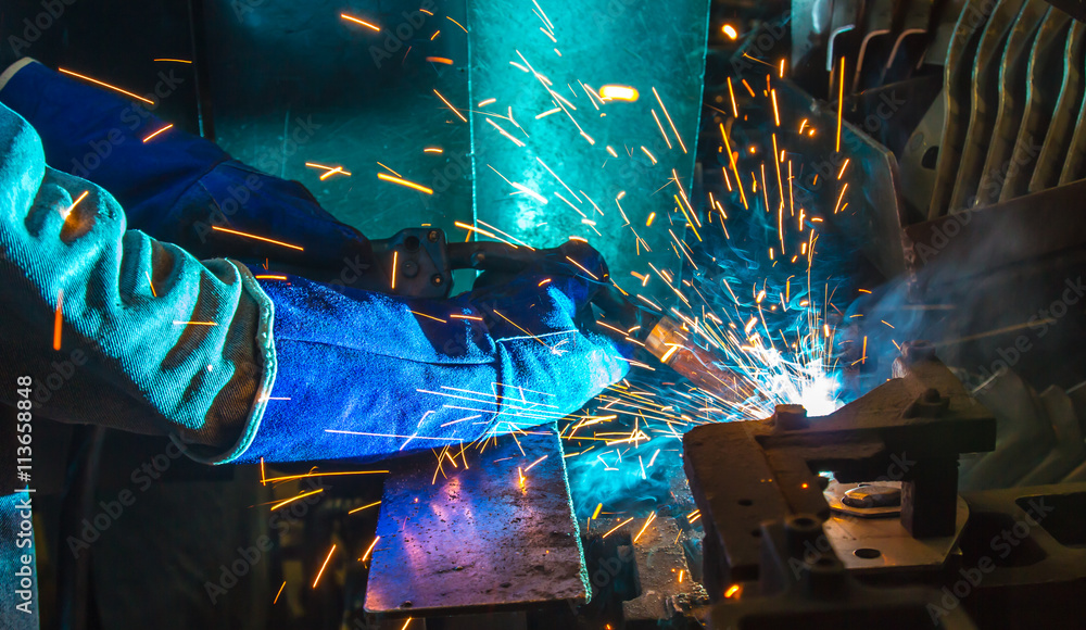 © wi6995 - welder Industrial automotive part in factory © wi6995 - welder Industrial automotive part in factory