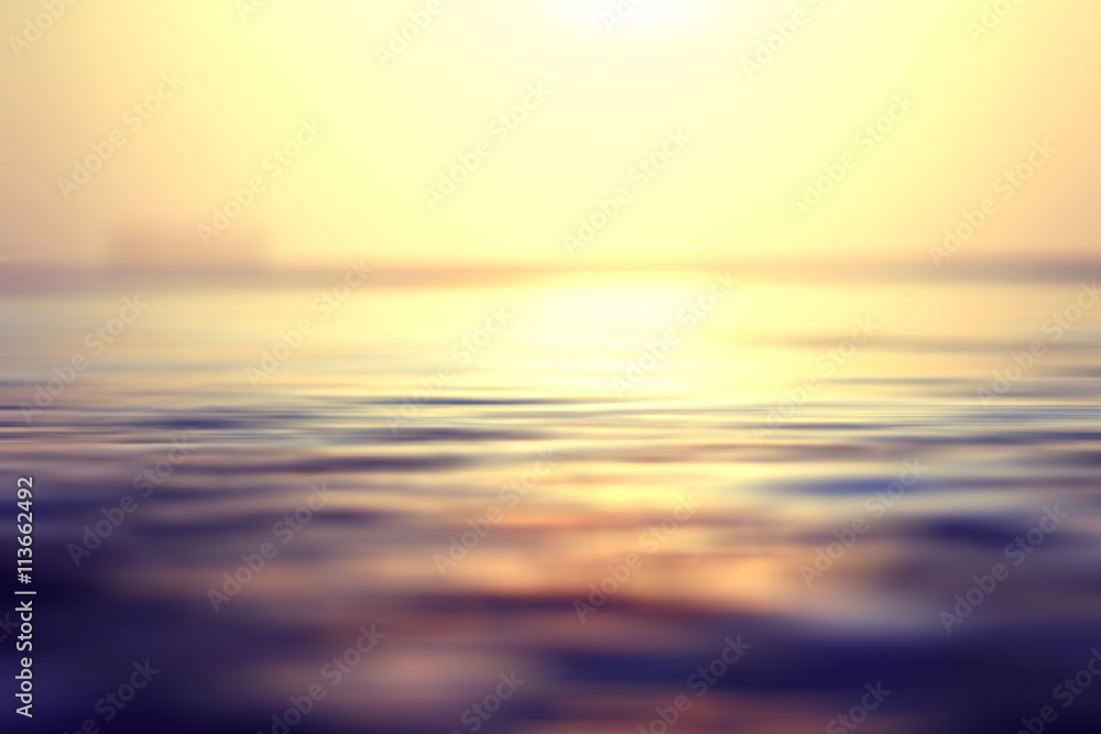 Obraz premium blurred background sunset on the sea