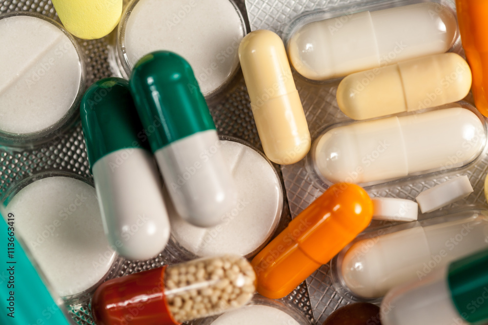 Drugs, pills and medication on table in close up photo Drugs, pills and medication on table in close up photo