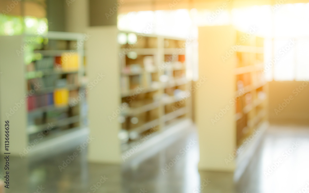 books on bookshelf in library, abstract blur defocused backgroun