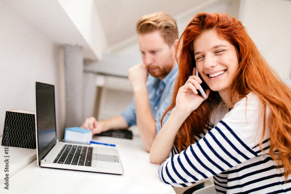 Beautiful woman calling in a white office Beautiful woman calling in a white office