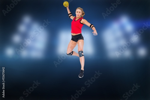 Composite image of female athlete with elbow pad throwing handball © vectorfusionart