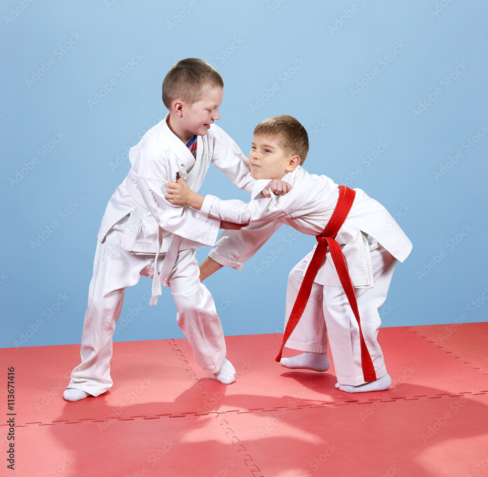 On the tatami small athletes train techniques of judo On the tatami small athletes train techniques of judo