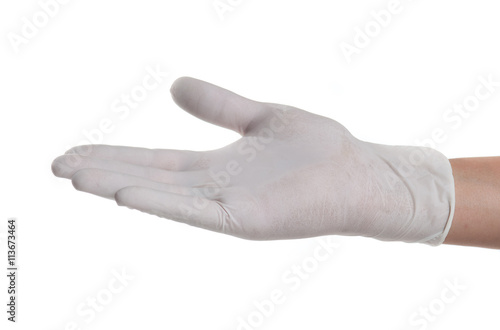 Doctor hand in sterile gloves showing sign, isolated on white ba