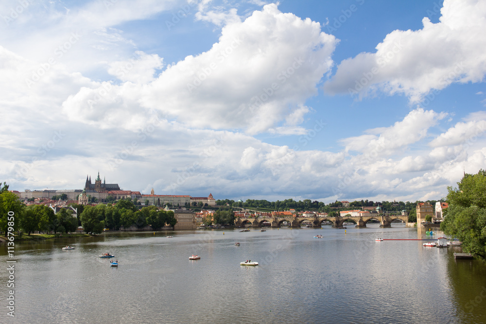 River Vltava View To Charles Bridge, Hraschin Castle And St. Vitus Cathedral in Prague Czech Republic