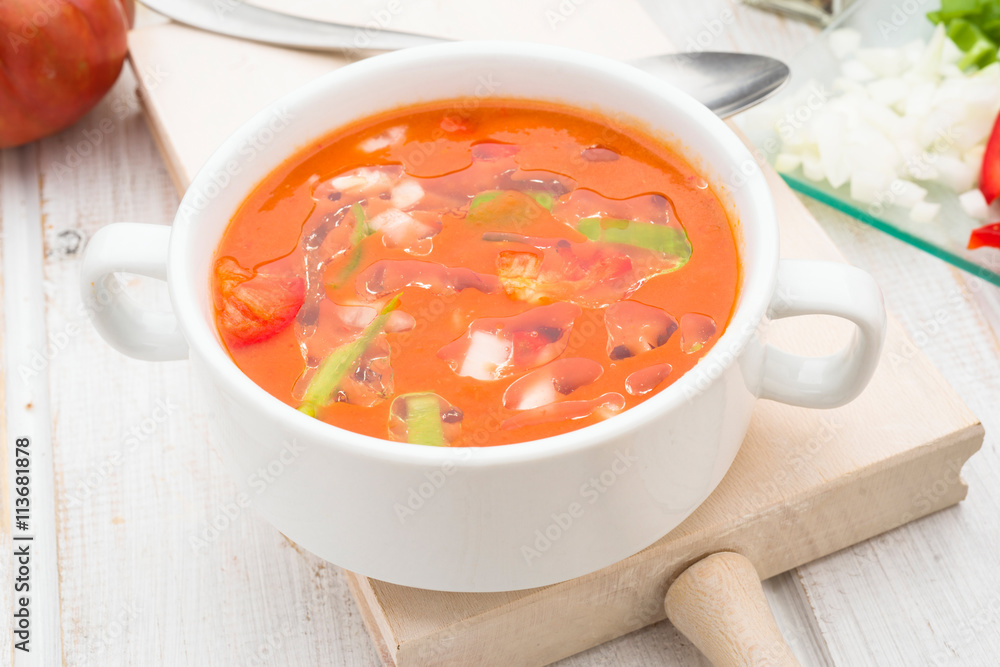 gazpacho soup with oil in white bowl gazpacho soup with oil in white bowl