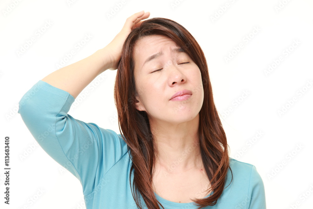 middle aged Japanese woman perplexe middle aged Japanese woman perplexe