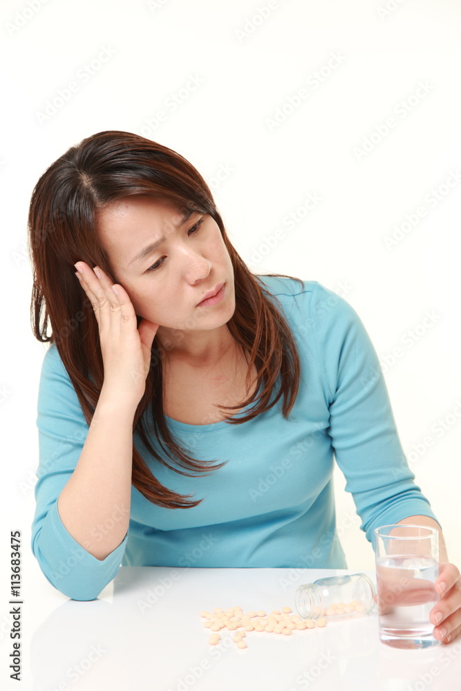 middle aged Japanese woman suffers from melancholy middle aged Japanese woman suffers from melancholy