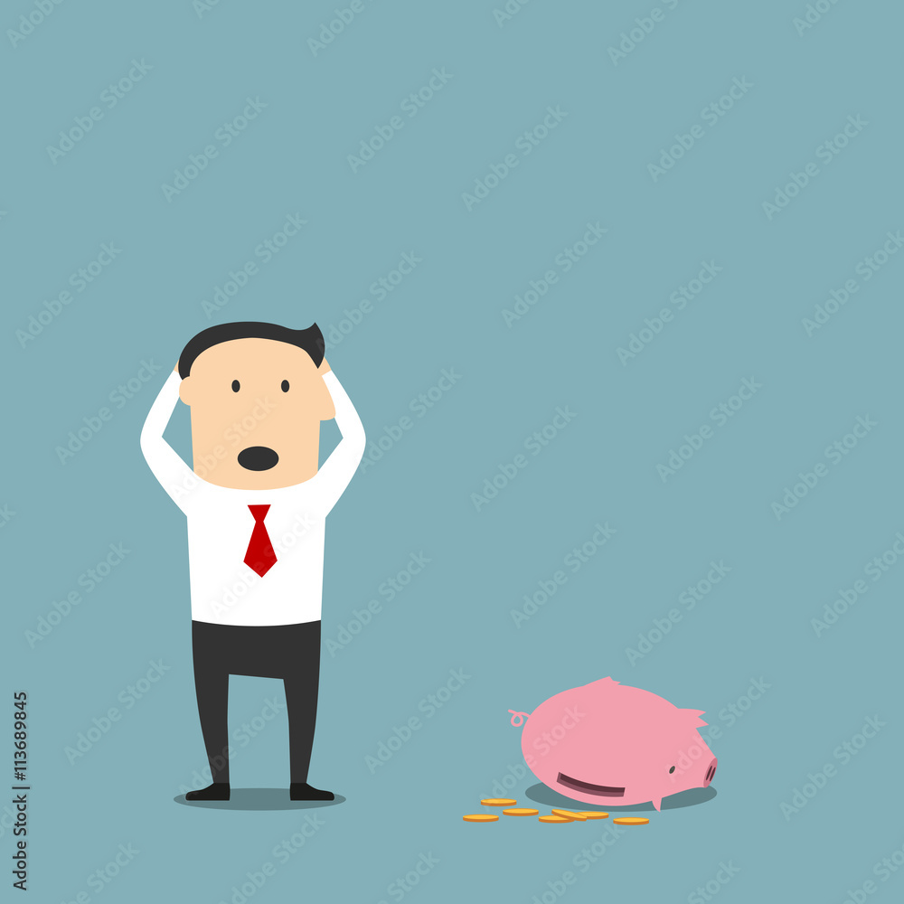 Bankrupt businessman with empty piggy bank Bankrupt businessman with empty piggy bank