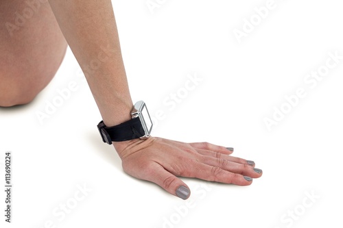 Close-up of athlete woman hand with wrist watch