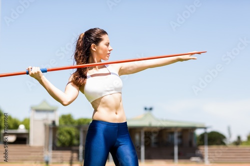 Εκτύπωση καμβά Female athlete about to throw a javelin