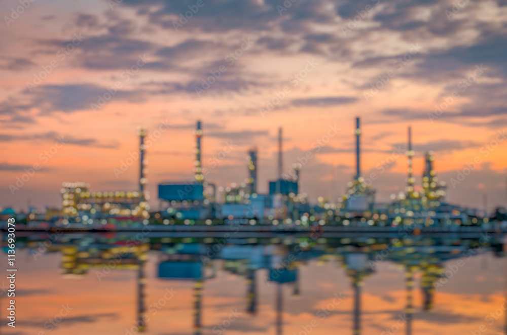 Oil refinery at sunrise time(Blurred For Background)
