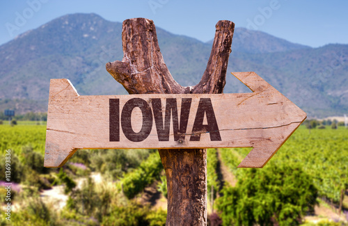 Iowa wooden sign with landscape background